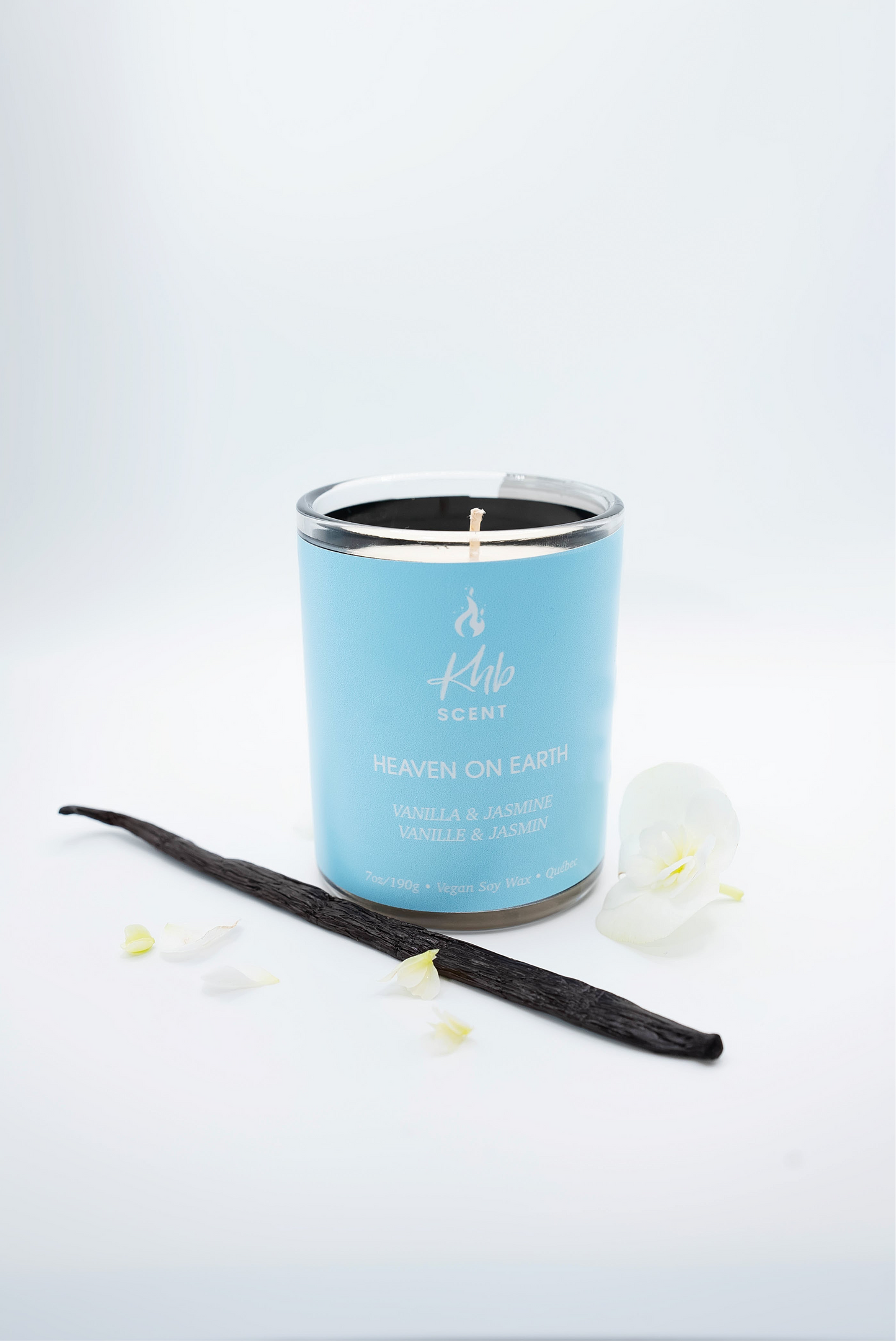 KHB SCENT Heaven on Earth vanilla jasmine candle deal in a blue container with vanilla pod and flower petals