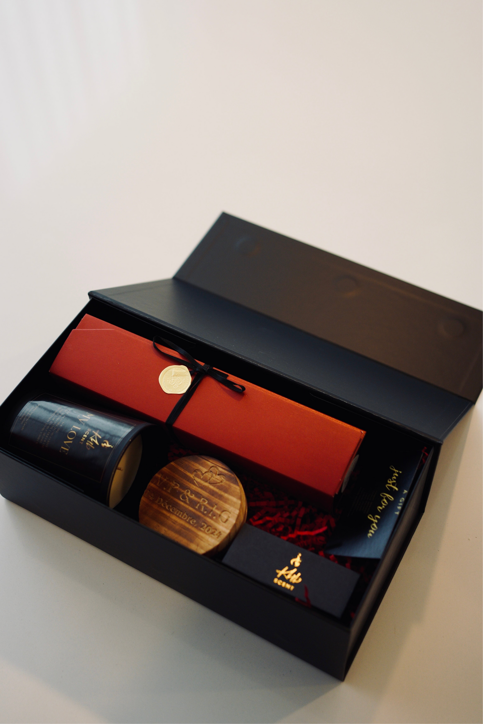 Elegant KHB SCENT romantic vegan candle box featuring a candle, decorative items, and luxurious packaging